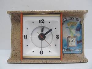 lot 56 image: NOS Unopened Retro Vintage 1970s Ceiling-Projecting Clock