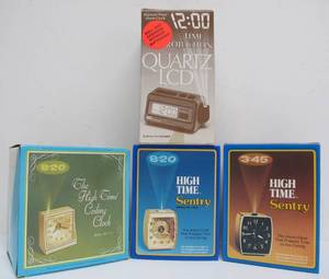 lot 73 image: Lot of 4 NOS Retro Vintage 1970s Unused Ceiling-Projecting Alarm Clocks