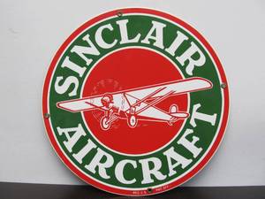 lot 204 image: Heavy Porcelain SINCLAIR AIRCRAFT Sign - Ande Rooney - 11 diameter