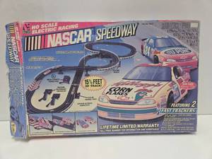 lot 370 image: Complete NASCAR SPEEDWAY Electric Slot Car Racing Set wCars