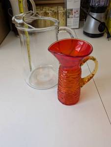 lot 163 image: Set of 2 Glass Pitchers Clear and Amberina Red-Orange Textured