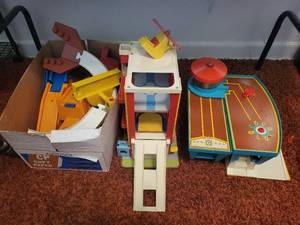 lot 211 image: Vintage Fisher Price Play Family Airport and Accessories