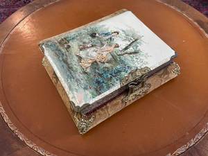 lot 34 image: Antique Victorian Music Box Photo Album with Watteau Style Cover