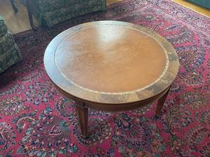 lot 35 image: Round Vintage Coffee Table with Leather Inlay and Wood Finish