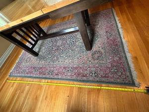 lot 143 image: Intricately Patterned Area Rug with Fringed Edges