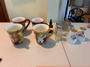 lot 162 image: Collection of Santa Mugs, Flask, Salt and Pepper Shakers, and Decorative Bottles