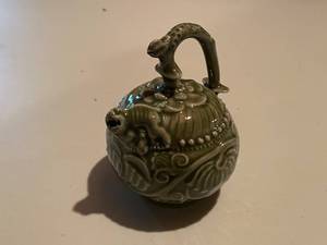 lot 385 image: Intricately Carved Green Ceramic Teapot with Dragon Lid