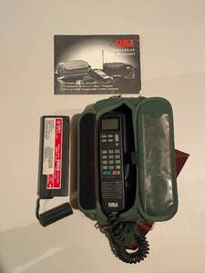 lot 397 image: Vintage OKI Portable Cellular Telephone with Case and Manual