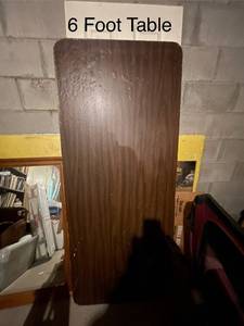 lot 501 image: Used 6-Foot Table with Woodgrain Finish