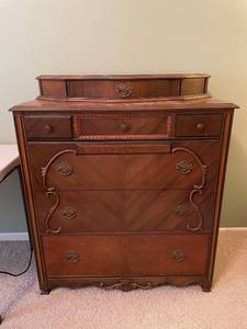 lot 518 image: Vintage Solid Wood Dresser with Intricate Carvings