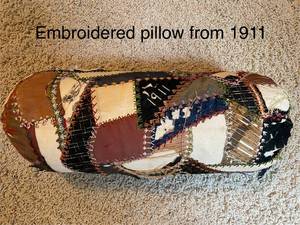 lot 578 image: Antique Crazy Quilt Cylindrical Pillow from 1911