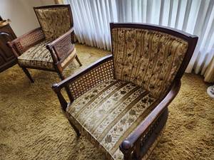 lot 5 image: Pair of Vintage Armchairs with Cane Detailing and Floral Upholstery