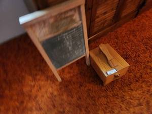 lot 102 image: Vintage Wooden Washboard and Shoe Polish Kit