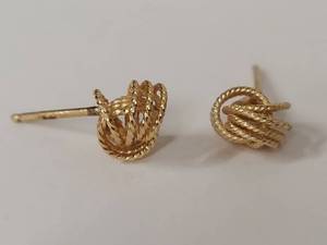 lot 123 image: Pair of 14k Gold Knot Earrings