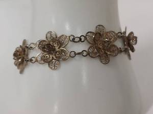 lot 132 image: Delicate Vintage Silver Filigree Floral Bracelet - Tested 80% Silver