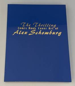 lot 109 image: EST. $100.00 - $250.00 Thrilling Comic Cover Art Of Alex Schomburg Hard Cover In Slip Case (Factory Sealed)