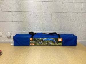 lot 445 image: Ozark Trail 10x10 Instant Slant Leg Pop Up Canopy Tent  Pop-Up Outdoor Shelter for Camping, Tailgating & Beach  Blue
