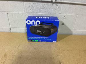 lot 399 image: Onn. Portable CDCassette Boombox with Bluetooth Wireless Technology