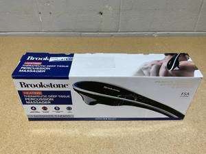 lot 262 image: Brookstone Handheld Percussion Body Massager, 4 Vibration Modes, 5 Interchangeable Heads