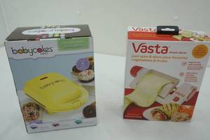 lot 112 image: Baby cakes Mini Donut Maker & Vasta Sheet Slicer
