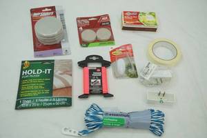 lot 189 image: NEW Lot Super Sliders, Paracord, masking tape, hold-it for rugs, clothesline, outlets, command clips, green light matches