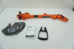 lot 205 image: NEW NEVER USED Black & Decker Easy Feed 14 String TrimmerEdger