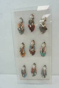 lot 248 image: Burmese Musicians Sculptures In Acrylic Case