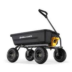 lot 11 image: GORILLA CARTS 4 cu. ft. Patented Poly Dumping Garden Cart, 600 lbs. Capacity, 35 in. x 22 in. x 8 in. Bed, 10 in. Pneumatic Tires  Customer Returns see Pictures