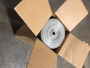 lot 26 image: HUSKY 20 ft. x 100 ft. Clear Plastic Sheeting  Customer Returns see Pictures