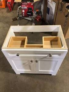lot 22 image: White Bathroom Vanity No Top Customer Returns see Pictures
