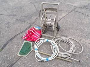 lot 51 image: Garden Hose, Garden Hose Reel, Minnow Net and Life Jacket