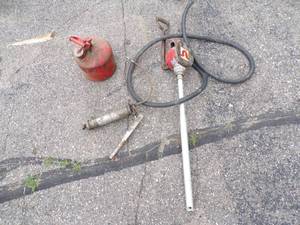 lot 63 image: Safety Can, Fuel hand pump, Grease Gun