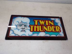 lot 44 image: Twin Thunder Slot Machine  Belly Glass