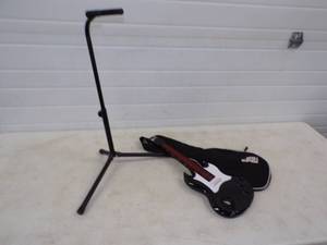 lot 113 image: Guitar Stand and Toy Guitar