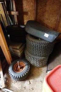 lot 180 image: Assorted Dirt Bike and Mower Accessories - Wheels, Tires, Seat