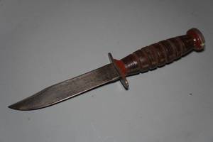 lot 44 image: Schrade Fixed Blade Knife - Leather Wrapped Handle