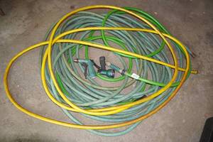 lot 97 image: Garden Hoses and Nozzles