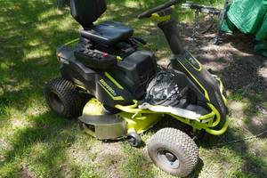 lot 1 image: Ryobi RM480e Electric Riding Lawn Mower