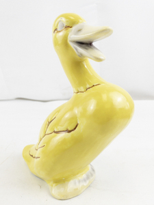 lot 31 image: Vintage Yellow Ceramic Duck Figurine