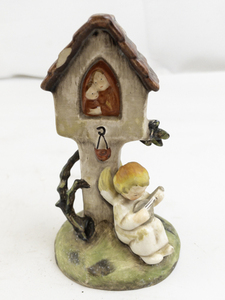 lot 33 image: Early Goebel Hummel Figurine Angel at Wayside Shrine with Mandolin