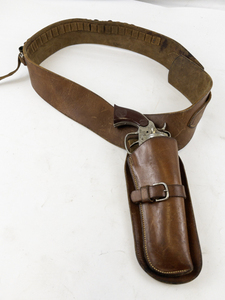 lot 178 image: Vintage Kilgore Metal Toy Gun with Leather Holster and Belt