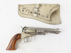 lot 182 image: Vintage Pioneer Cap Gun Revolver with Leather Holster