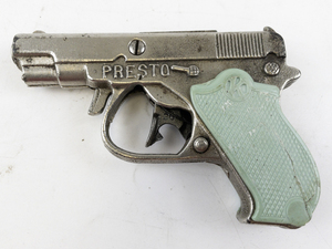 lot 186 image: Vintage Kilgore Presto Cast Iron Cap Gun with Green Handle