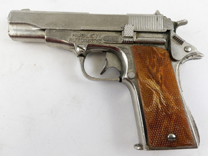 lot 211 image: Vintage 1950s Hubley Automatic Cap Gun with Amber Handles