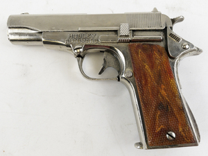 lot 212 image: Vintage 1950s Hubley Automatic Cap Gun with Amber Handles