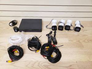 lot 10 image: Revo Security System with 4 Revo Cameras, video recorder, computer mouse, wires included