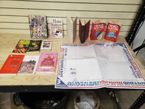 lot 40 image: Box of Misc. Books and Ghostbusters white posterboard