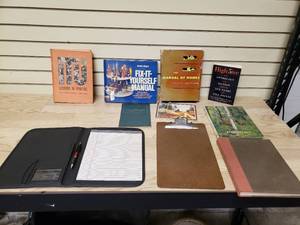lot 54 image: Books, Brown & Red Book signed by Jane Fonda, clipboard, and legal pad