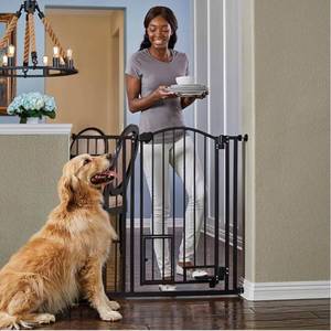 lot 140 image: Carlson 38.5 Inch Extra Tall Arched Hands Free Gate, Fits Openings 29-43.5 Inches Wide, Includes Small Pet Door, Black