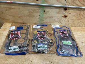 lot 144 image: Lot of 3 - Various DNJ Automotive Gasket Sets